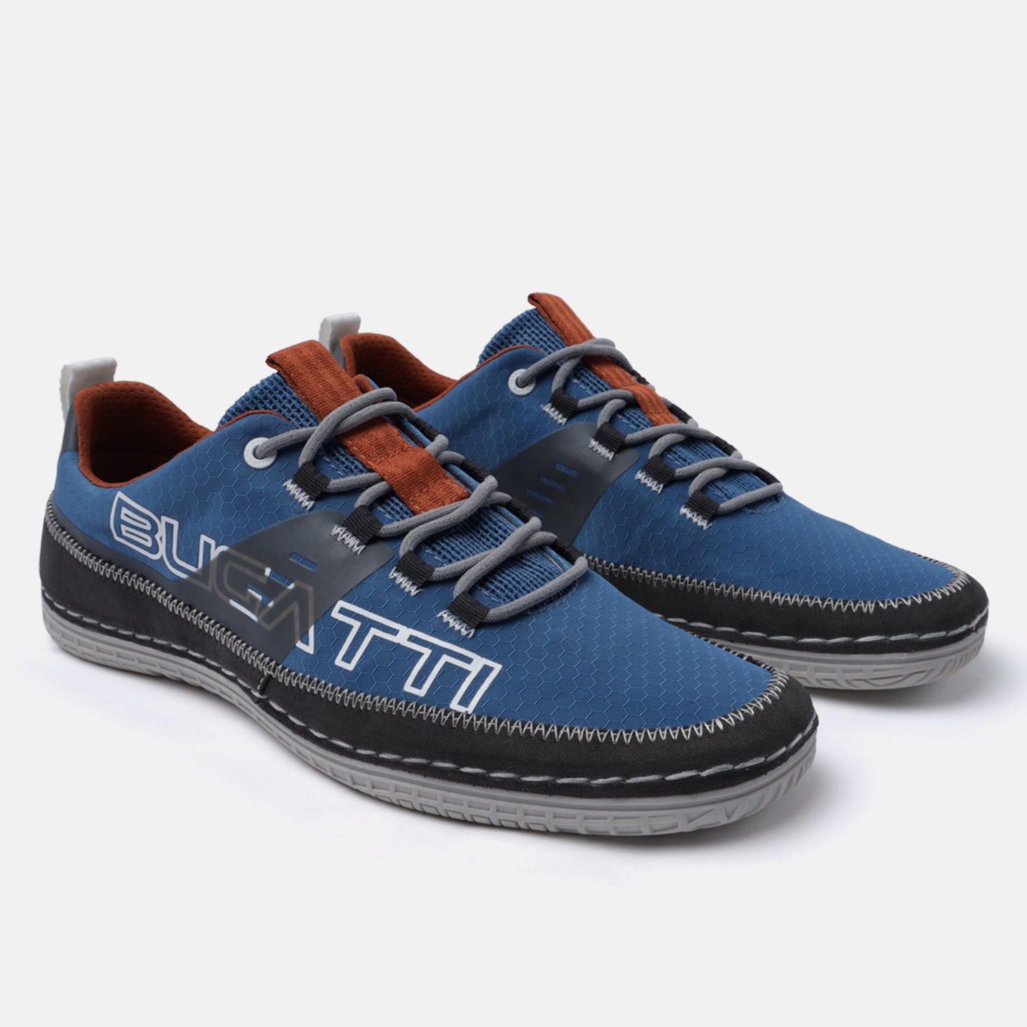 Blue casual low top sneakers by Bugatti, featuring gray laces, with brown accents.