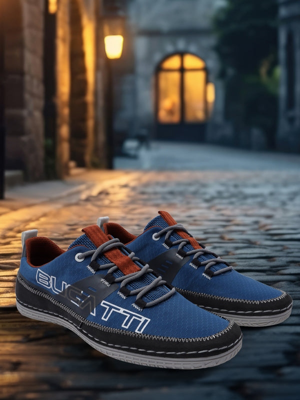 A blue Men's bugatti Sneakers featuring a round plain toe, zero heels heel. Made from textile with a durable tpr outsole, this laces design offers both style and comfort.