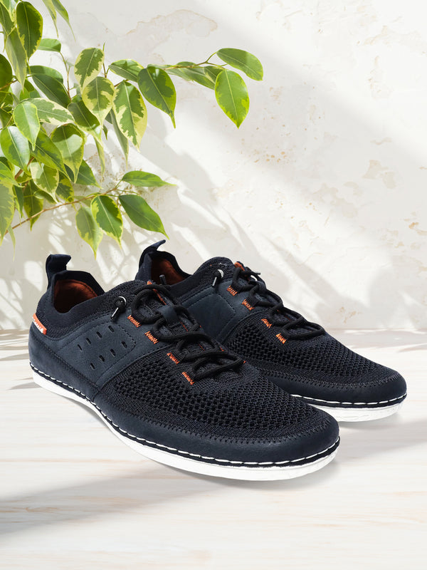 A blue Men's bugatti Sneakers featuring a round plain toe, zero heels heel. Made from textile with a durable tpr outsole, this laces design offers both style and comfort.