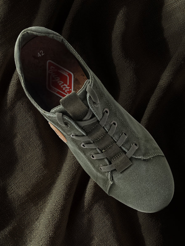 A green Men's bugatti Sneakers featuring a round plain toe, zero heels heel. Made from textile with a durable eva outsole, this laces design offers both style and comfort.
