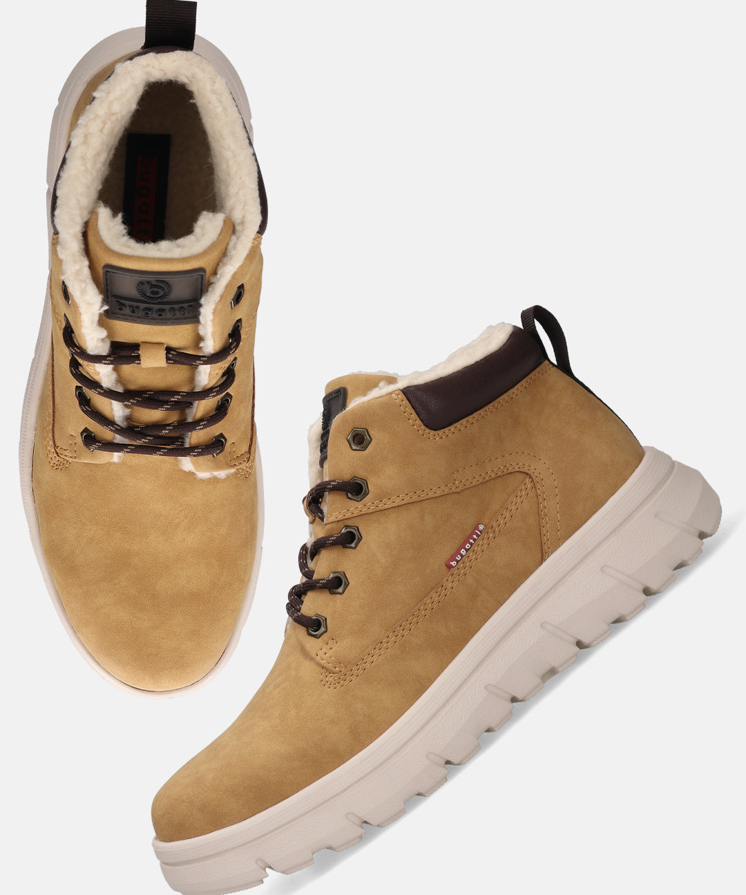 Yellow comfort casual boots by Bugatti with brown laces and a white ridged sole.