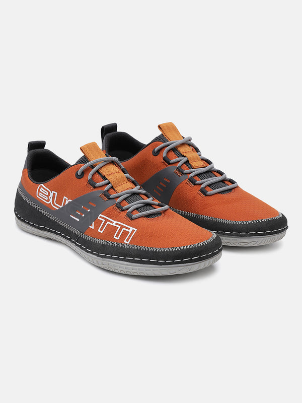A grey Men's bugatti Sneakers featuring a round plain toe, zero heels heel. Made from textile with a durable tpr outsole, this laces design offers both style and comfort.