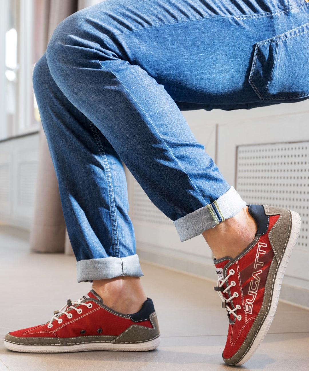 A grey Men's bugatti Sneakers featuring a round plain toe, zero heels heel. Made from synthetic with a durable tpr outsole, this laces design offers both style and comfort.