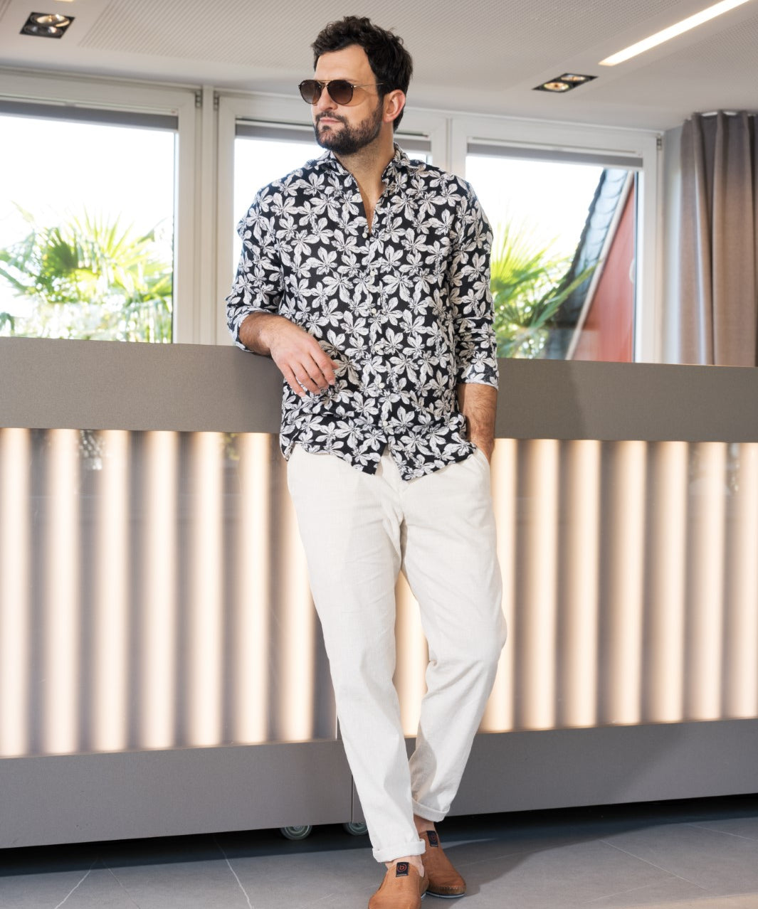 Leather slip-on shoes by bugatti, in brown with contrast stitching and a cork midsole.