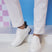 A white Men's bugatti Sneakers featuring a round plain toe, zero heels heel. Made from synthetic with a durable tpr outsole, this laces design offers both style and comfort.