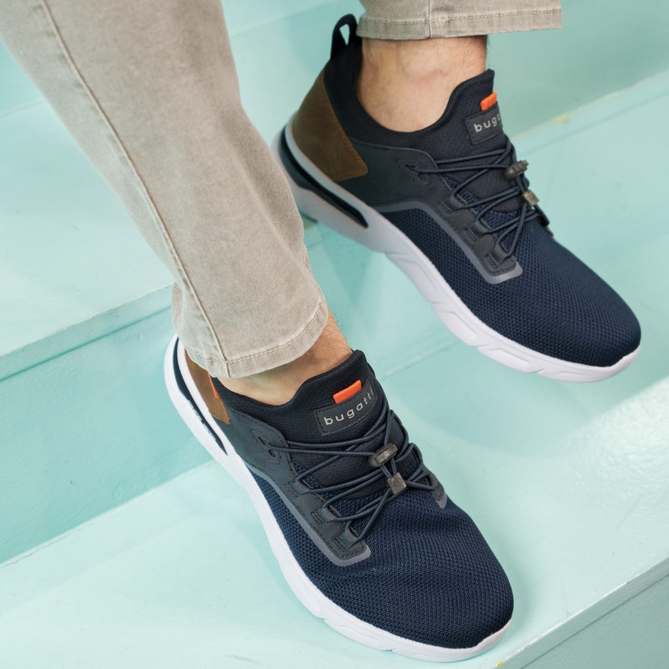 A blue Men's bugatti Athileisure Sneakers featuring a round plain toe, zero heels heel. Made from textile with a durable eva outsole, this laces design offers both style and comfort.