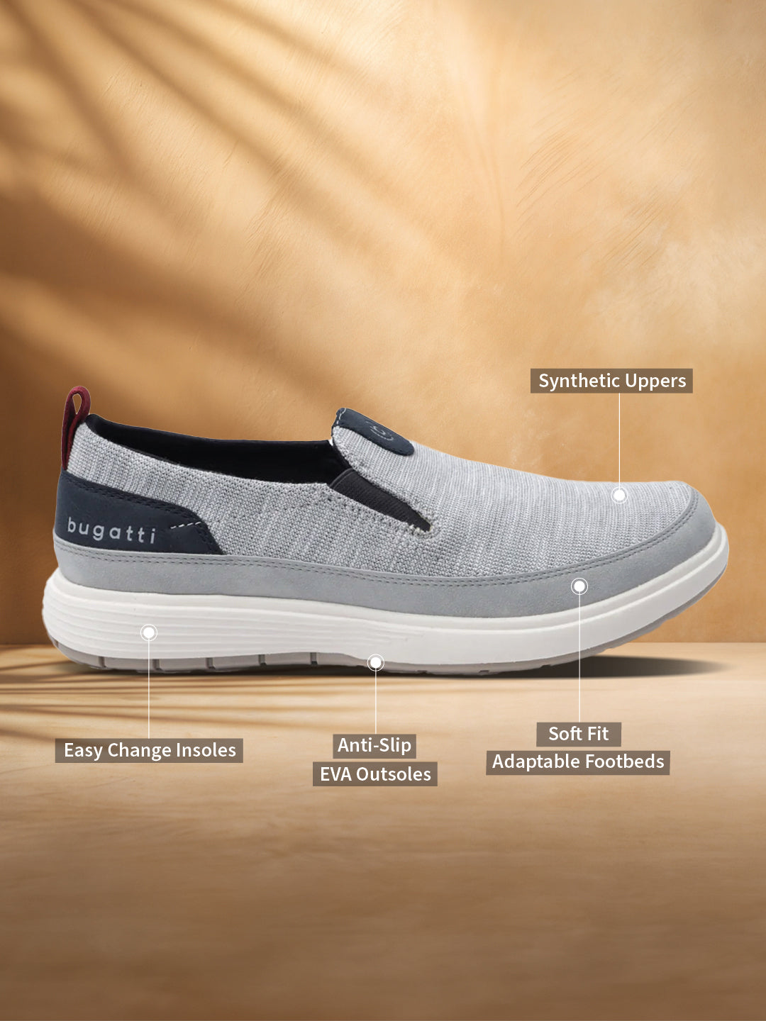 A grey Men's bugatti Casual Loafers featuring a round plain toe, zero heels heel. Made from synthetic with a durable eva outsole, this slip-on design offers both style and comfort.