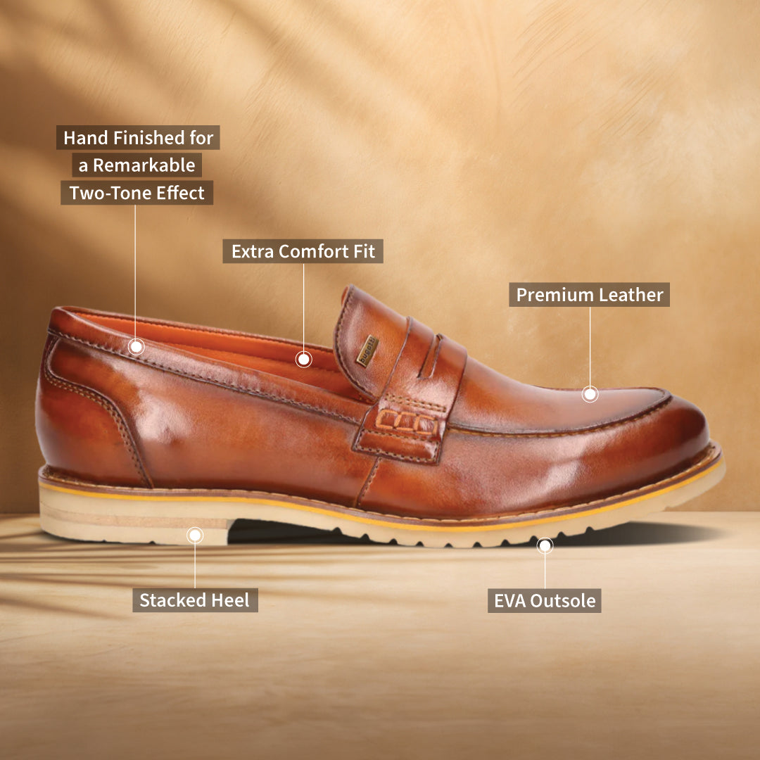 A cognac Men's bugatti Penny Loafer featuring a round apron toe, stacked heel, and a extra wide fit. Made from premium genuine leather with a durable eva outsole, this slip-on design offers both style and comfort.