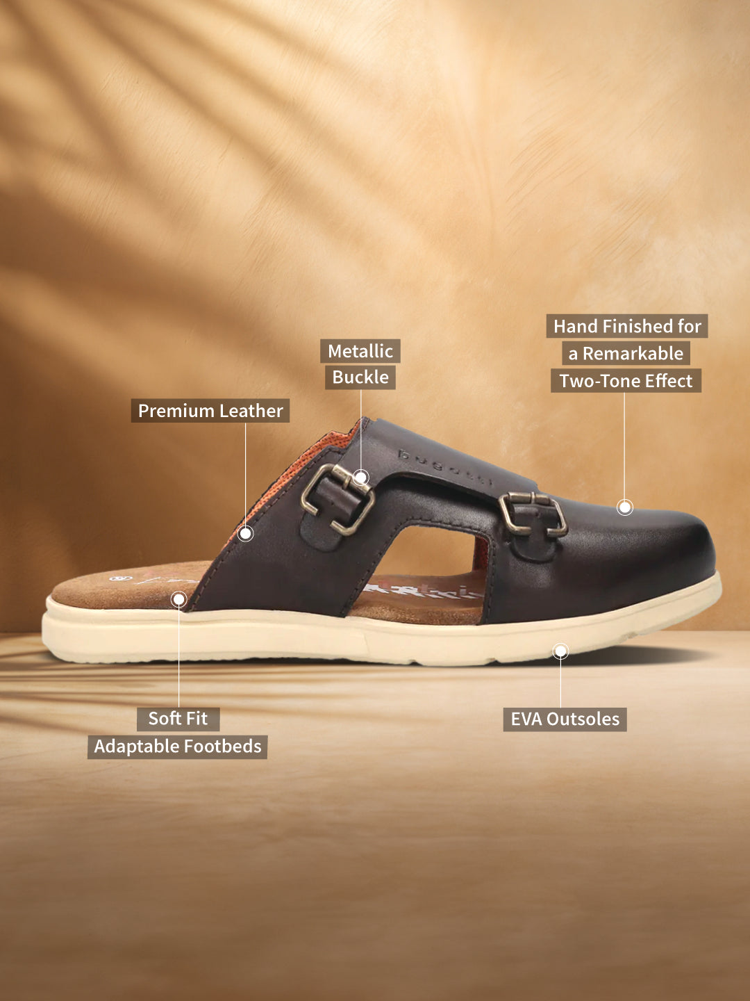 A brown Men's bugatti Mules featuring a round plain toe, zero heels heel. Made from premium genuine leather with a durable eva outsole, this slip-on design offers both style and comfort.