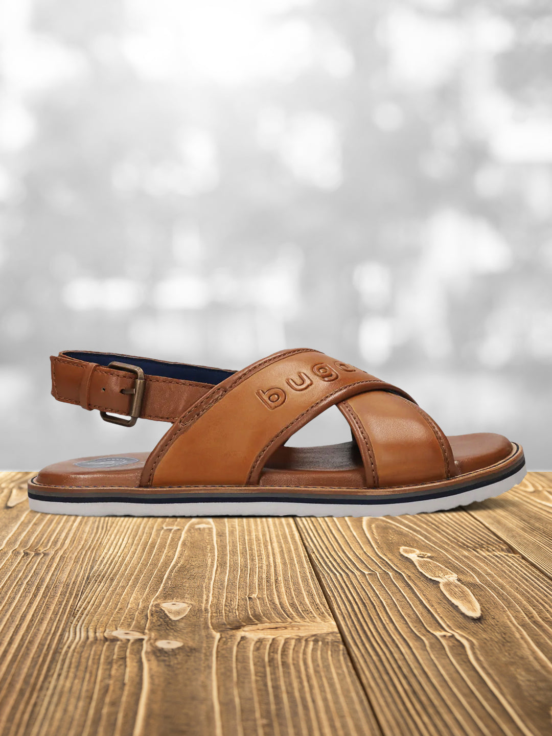 A cognac Men's bugatti Back Strap Sandals featuring a open toe plain toe, zero heels heel, and a wide fit. Made from premium genuine leather with a durable eva outsole, this buckle design offers both style and comfort.