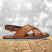 A cognac Men's bugatti Back Strap Sandals featuring a open toe plain toe, zero heels heel, and a wide fit. Made from premium genuine leather with a durable eva outsole, this buckle design offers both style and comfort.