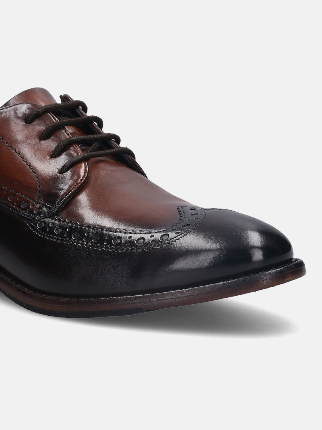 A brown Men's bugatti Brogue featuring a round wingcap, stacked heel. Made from premium genuine leather with a durable leather outsole, this laces design offers both style and comfort.
