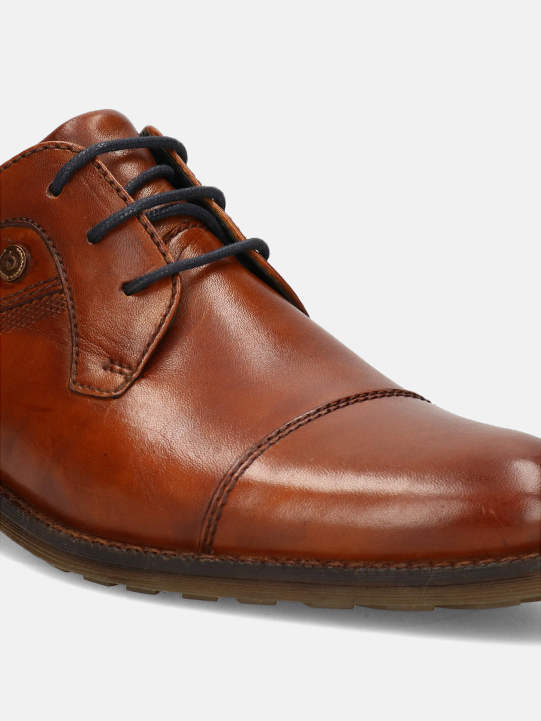 A cognac Men's bugatti  Derby featuring a pointed toe toe cap, stacked heel. Made from premium genuine leather with a durable leather outsole, this laces design offers both style and comfort.