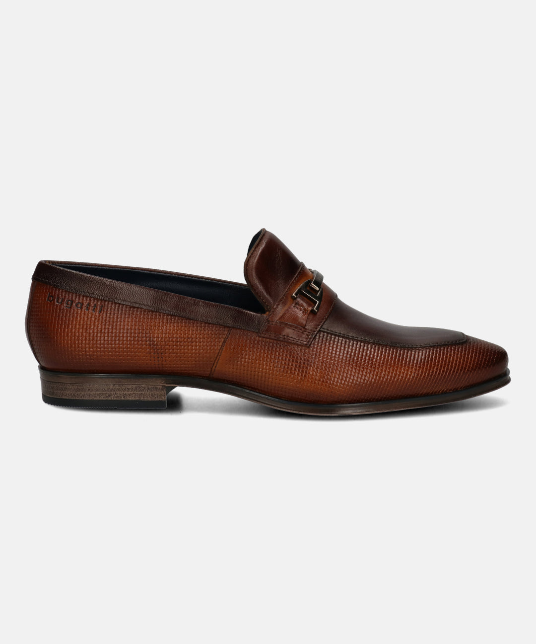 Cognac leather slip-on shoe by Bugatti, featuring a textured upper and decorative metal hardware.