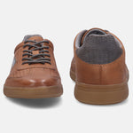 A cognac Men's bugatti  Sneakers featuring a round toe plain toe, zero heels heel, and a wide fit. Made from nubuck leather with a durable tpr outsole, this laces design offers both style and comfort.