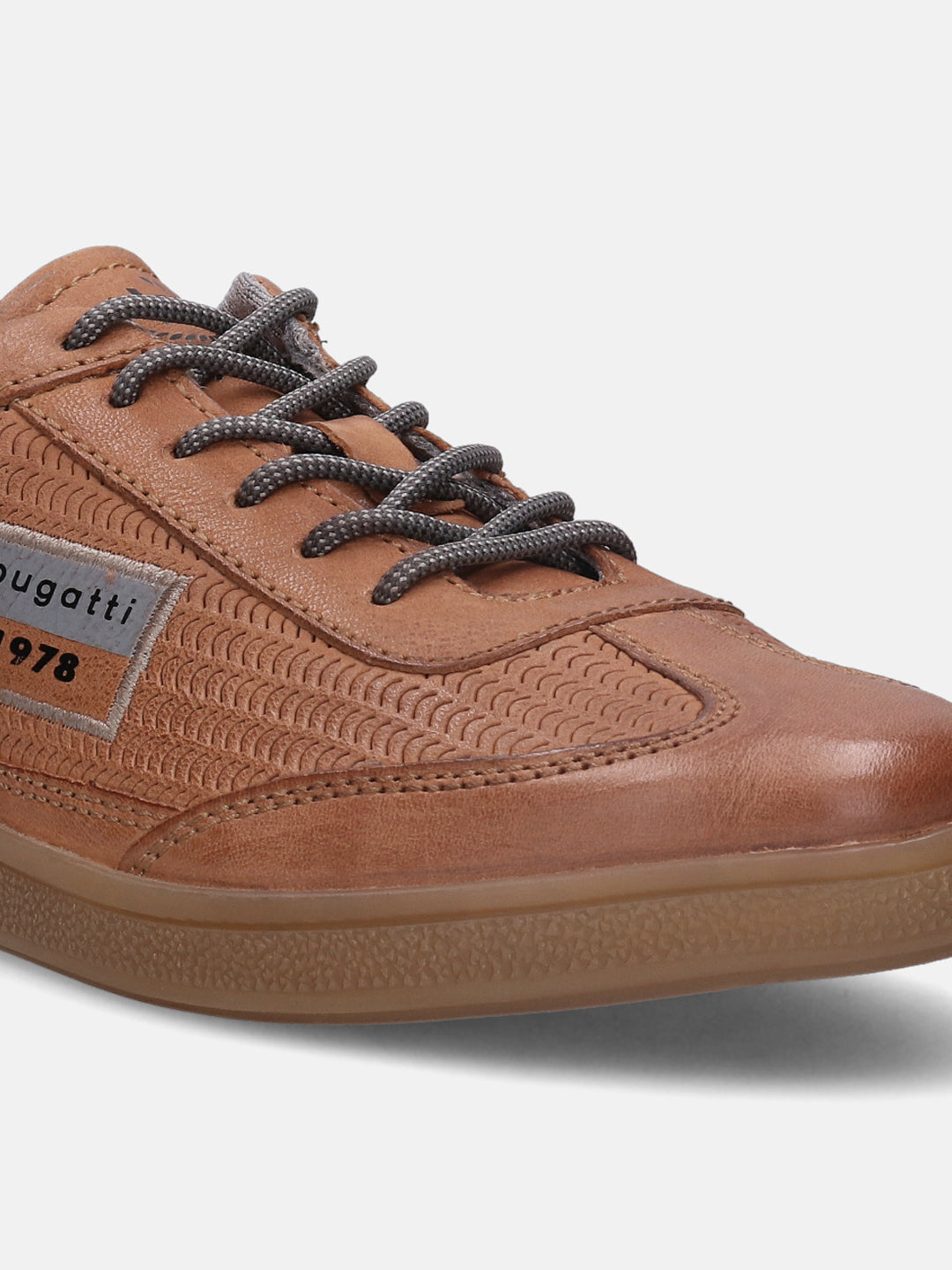 A cognac Men's bugatti  Sneakers featuring a round toe plain toe, zero heels heel, and a wide fit. Made from nubuck leather with a durable tpr outsole, this laces design offers both style and comfort.