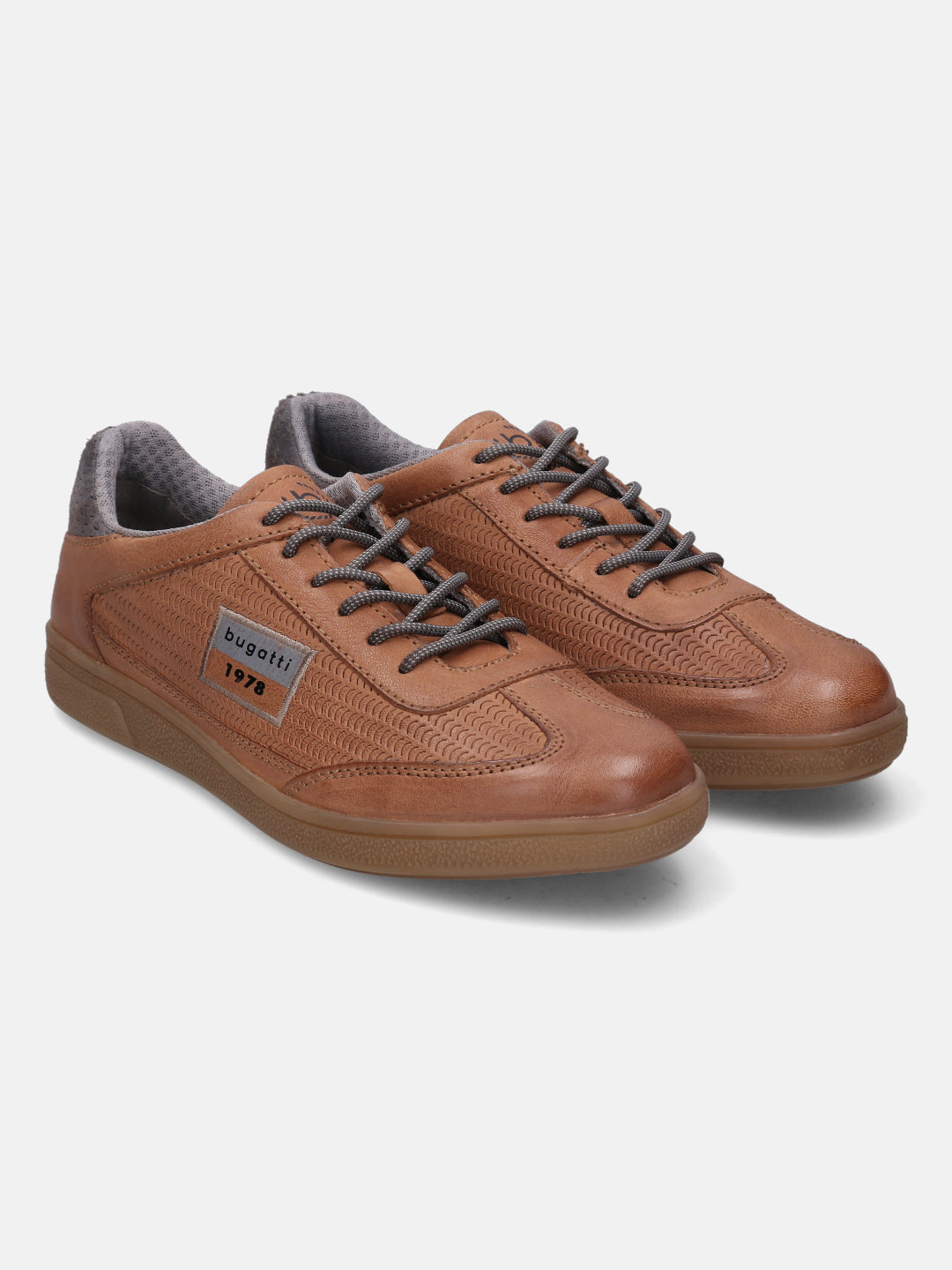 A cognac Men's bugatti  Sneakers featuring a round toe plain toe, zero heels heel, and a wide fit. Made from nubuck leather with a durable tpr outsole, this laces design offers both style and comfort.