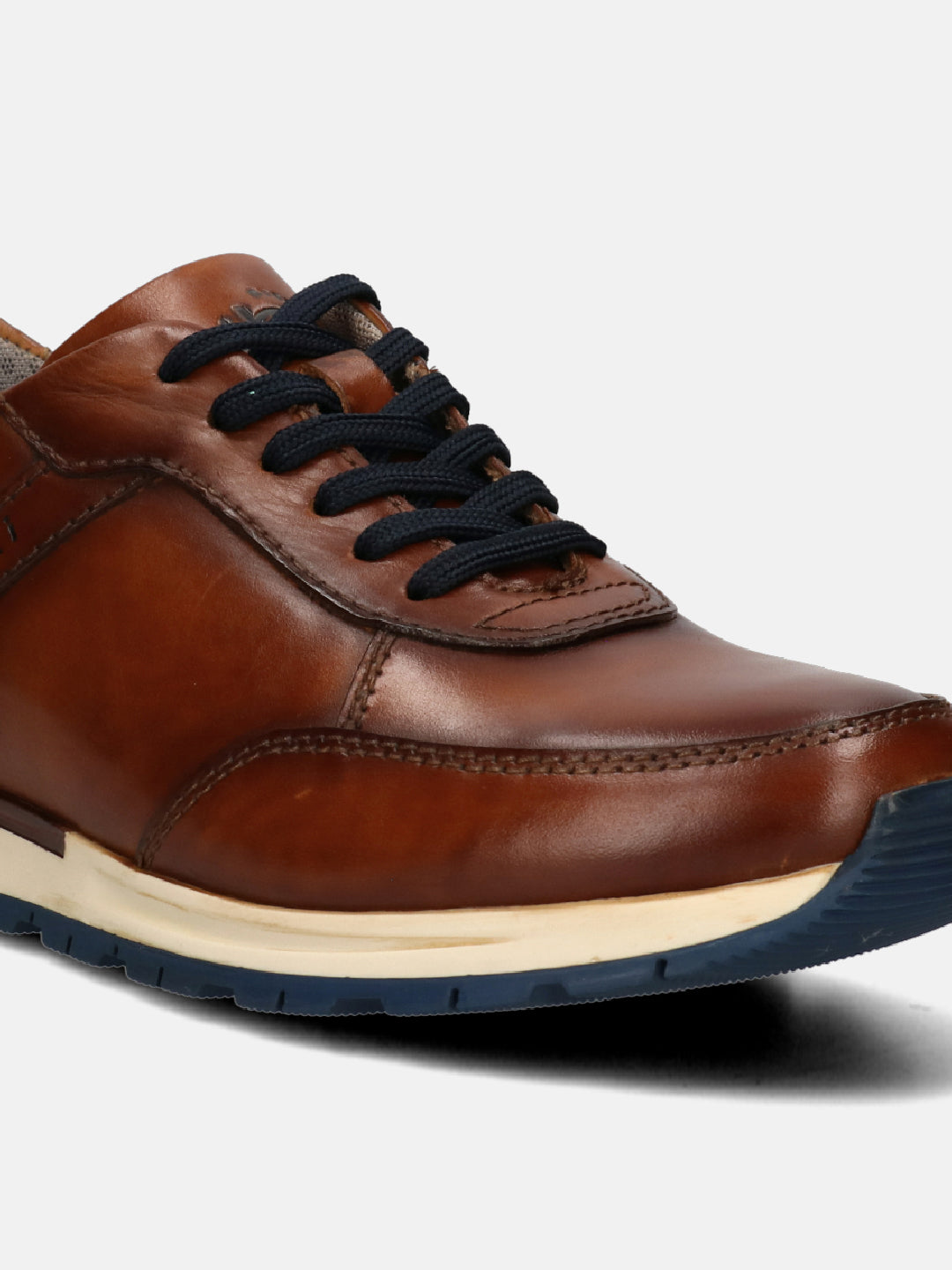 A cognac Men's bugatti  Sneakers featuring a round toe plain toe, zero heels heel. Made from premium genuine leather with a durable tpr outsole, this laces design offers both style and comfort.